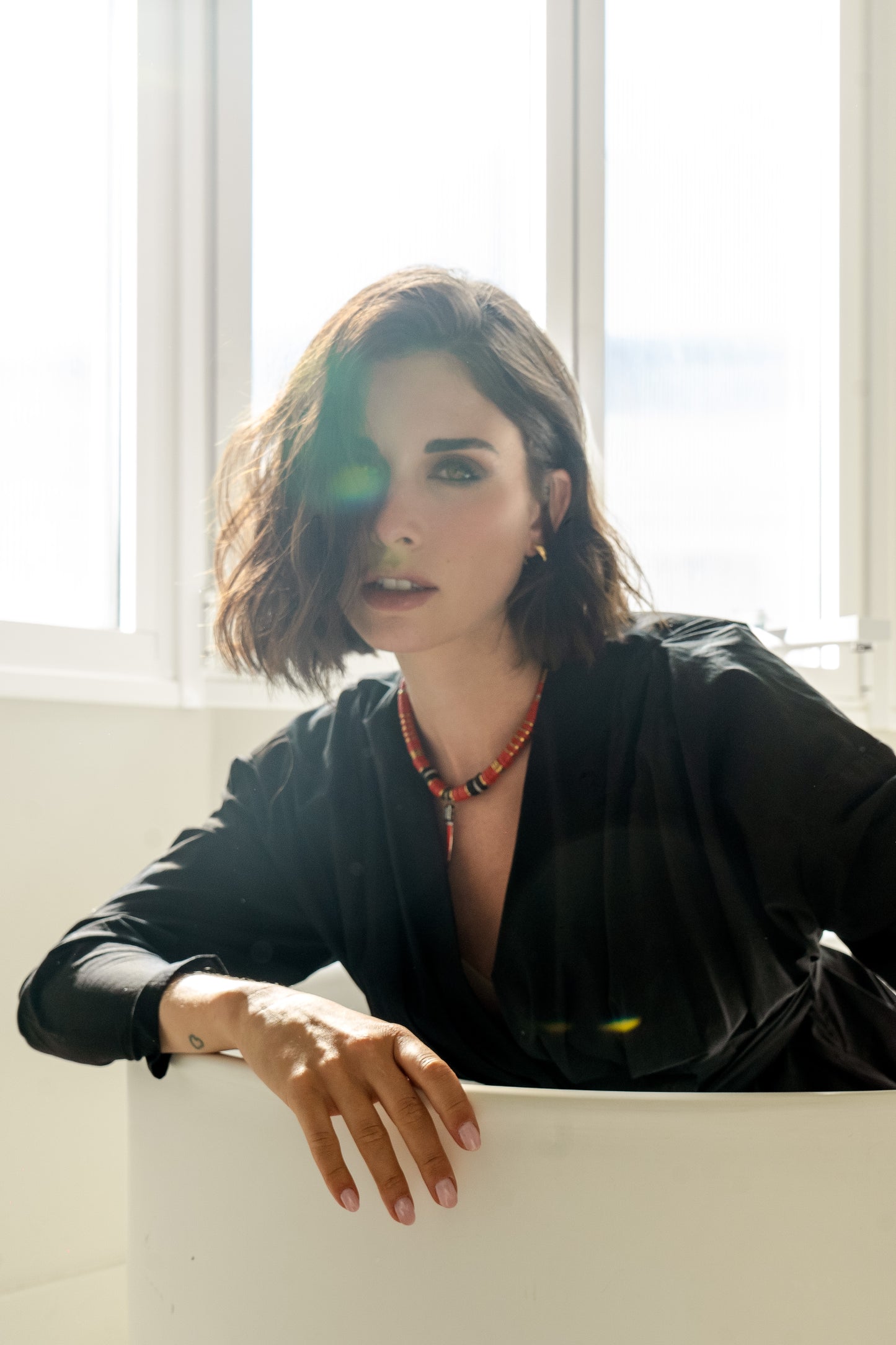 Puka Madre Topaz Red Horn